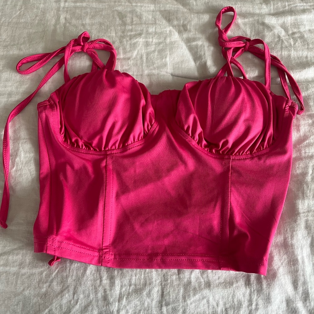 pink cropped shirt